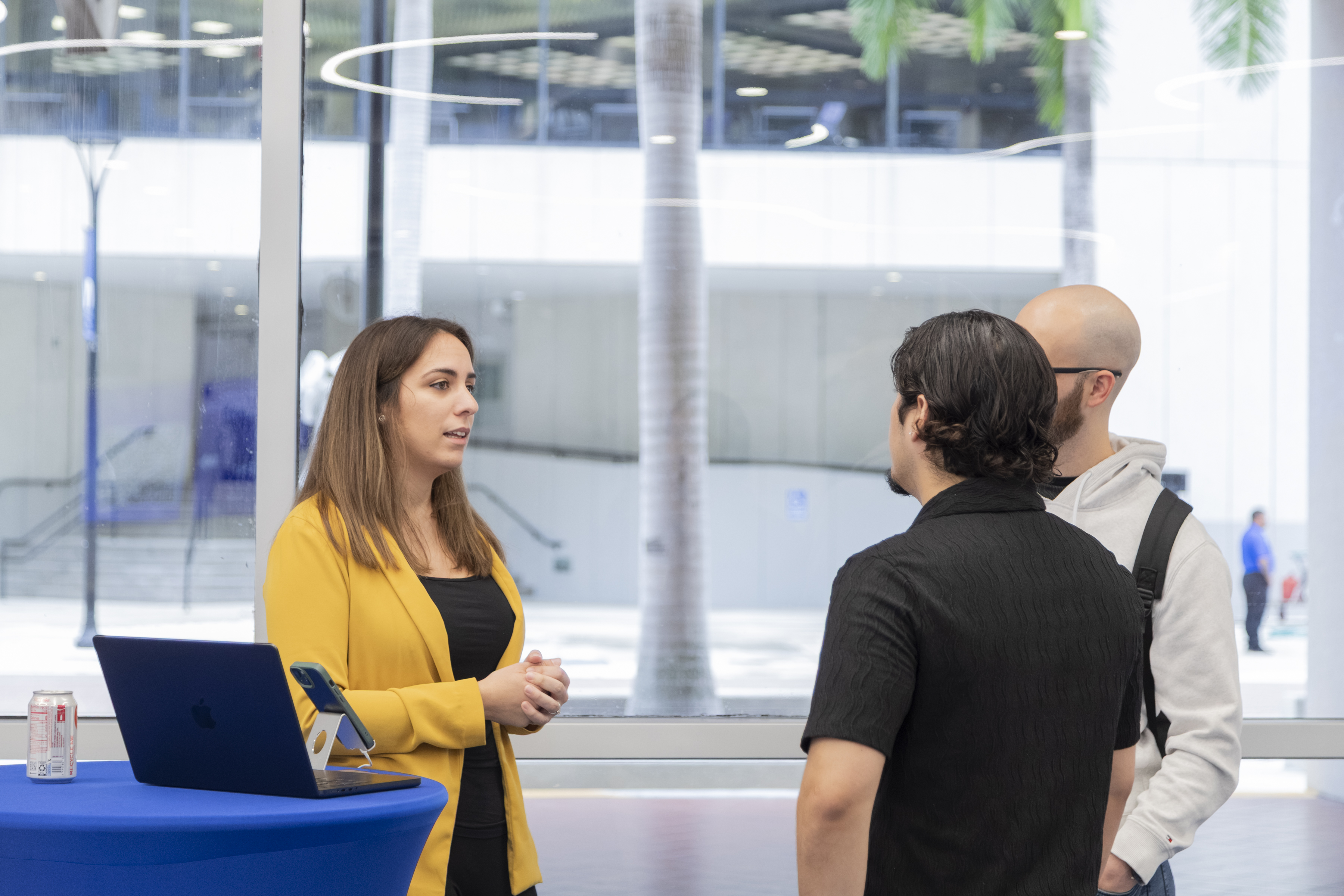 Demonstrating Raggle iOS app at showcase booth